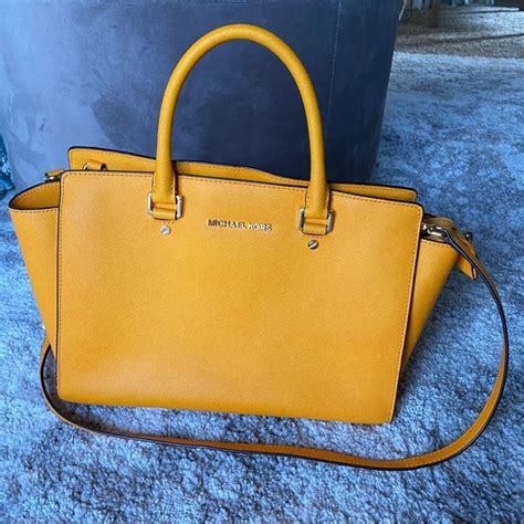 yellow handbag michael kors|Michael Kors mustard yellow purse.